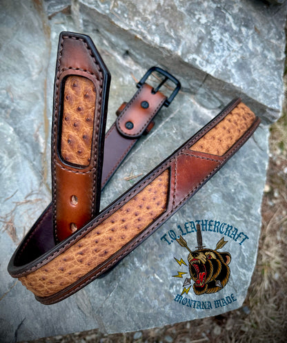 Ostrich skin inlays, medium brown outer strap with airbrush dyed edges, medium brown stitching, and matte black buckle